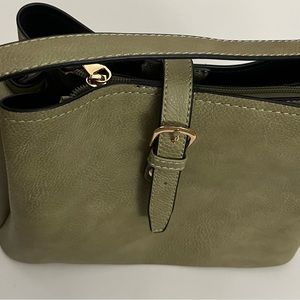 Bucket satchel bag in moss green color with detachable guitar straps medium size